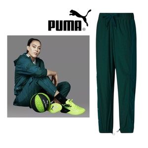 PUMA Women's Stewie Storm Watch Packable Snap Pants